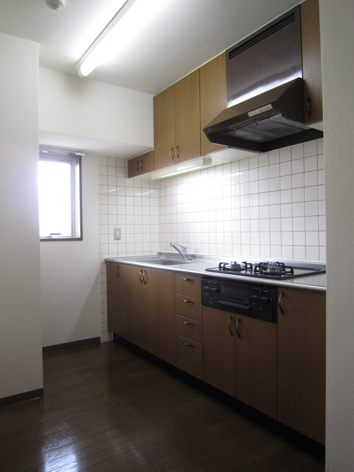 Kitchen. Glass top stove of the kitchen is spacious