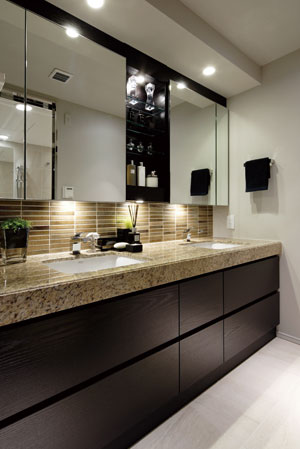 Bathing-wash room.  [bathroom] Counter tops of natural stone Ya, Calm space in which the light brown to keynote. And, High-quality equipment have been installed to stick to comfortable to use.