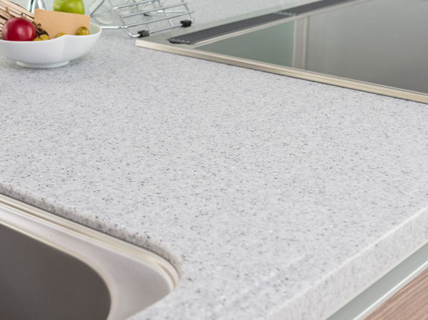 Kitchen.  [Natural stone kitchen counter] A beautifully smooth texture, Also offers superior natural granite to the durability and cleanability.