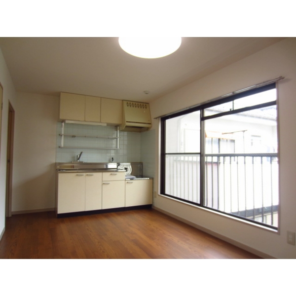 Living and room. Bright dining in the large windows