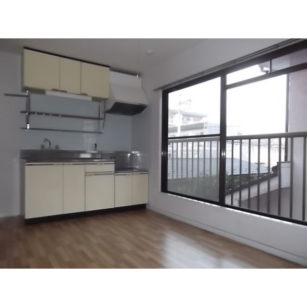 Kitchen. Bright kitchen with a window of gas two-burner stove installation Allowed