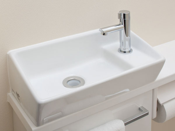 Toilet.  [Toilet with hand washing counter] The toilet, It has established a style of hand washing counter loaded with compact hand wash basin on top of the counter. I felt a wide and clear even to the eye, Easy-to-use design in a compact.