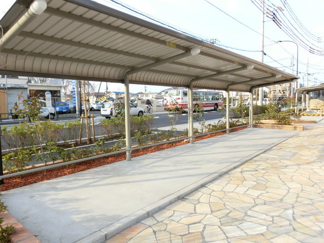 Parking lot. It is a bicycle parking space with a roof