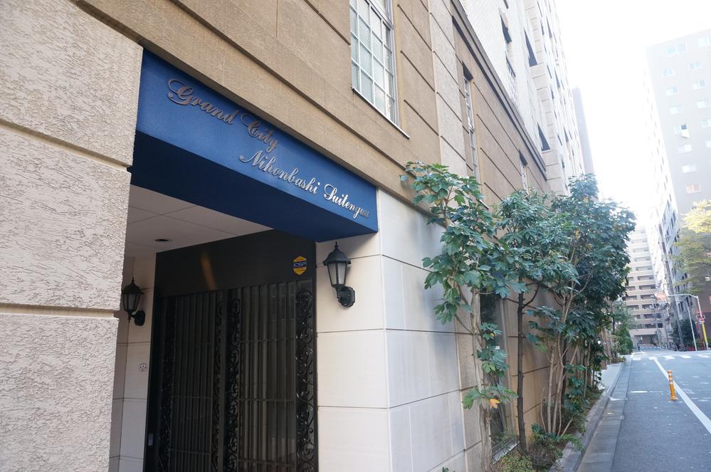 Entrance. Mansion entrance bright blue eye-catching.