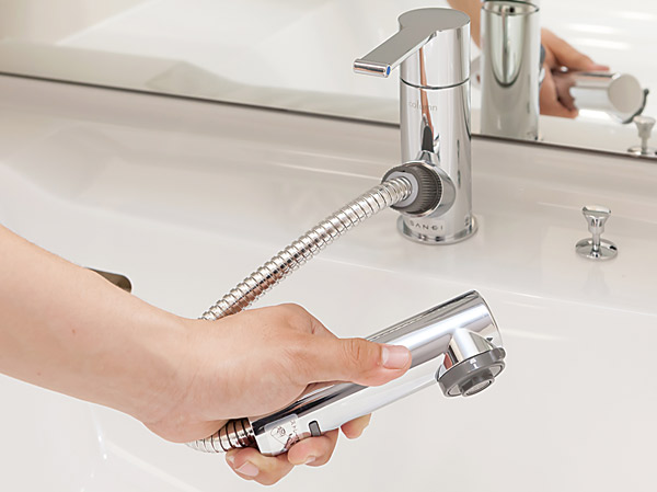 Bathing-wash room.  [Single-lever shower mixing faucet] Useful in cleansing and vanity of care, Type that can be drawn head. Adoption of a single-lever mixing water washing, which can adjust the amount of water and the water temperature with one hand.
