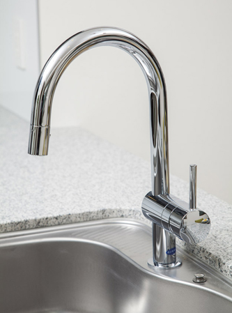 Kitchen.  [Water-saving faucet (Grohe Co., Ltd.)] In order to prevent the waste of water, Adopted water-saving in the faucet of the kitchen. I was conscious every day of eco.  ※ B type water purifier integrated faucet (made CLEANSUI)