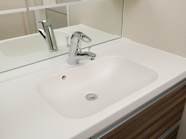 Bathing-wash room.  [Bowl-integrated top board] The vanity counter, It has adopted a stylish bowl-integrated top board.