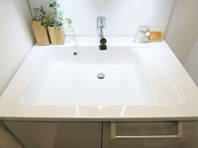 Wash basin, toilet. ~ Interior was completed ~