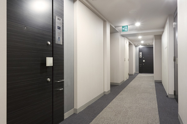 Other. The inner corridor design such as hotel. It enhances the privacy of blocks the outside of the line of sight. Until each dwelling unit carpeted (2013 February shooting)