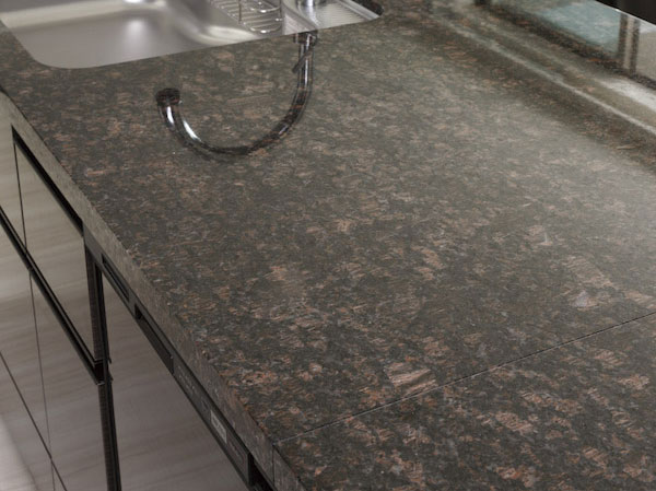 Kitchen.  [Natural stone counter] Gracefully directing profound feeling and the natural texture of the natural stone unique to beautify the kitchen. Also richly enhanced color sense of unity with the living.