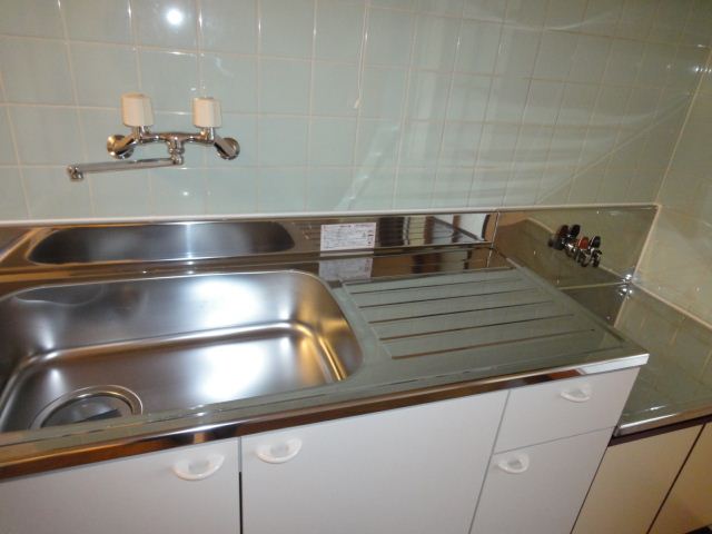Kitchen. It is with a kitchen hot water supply