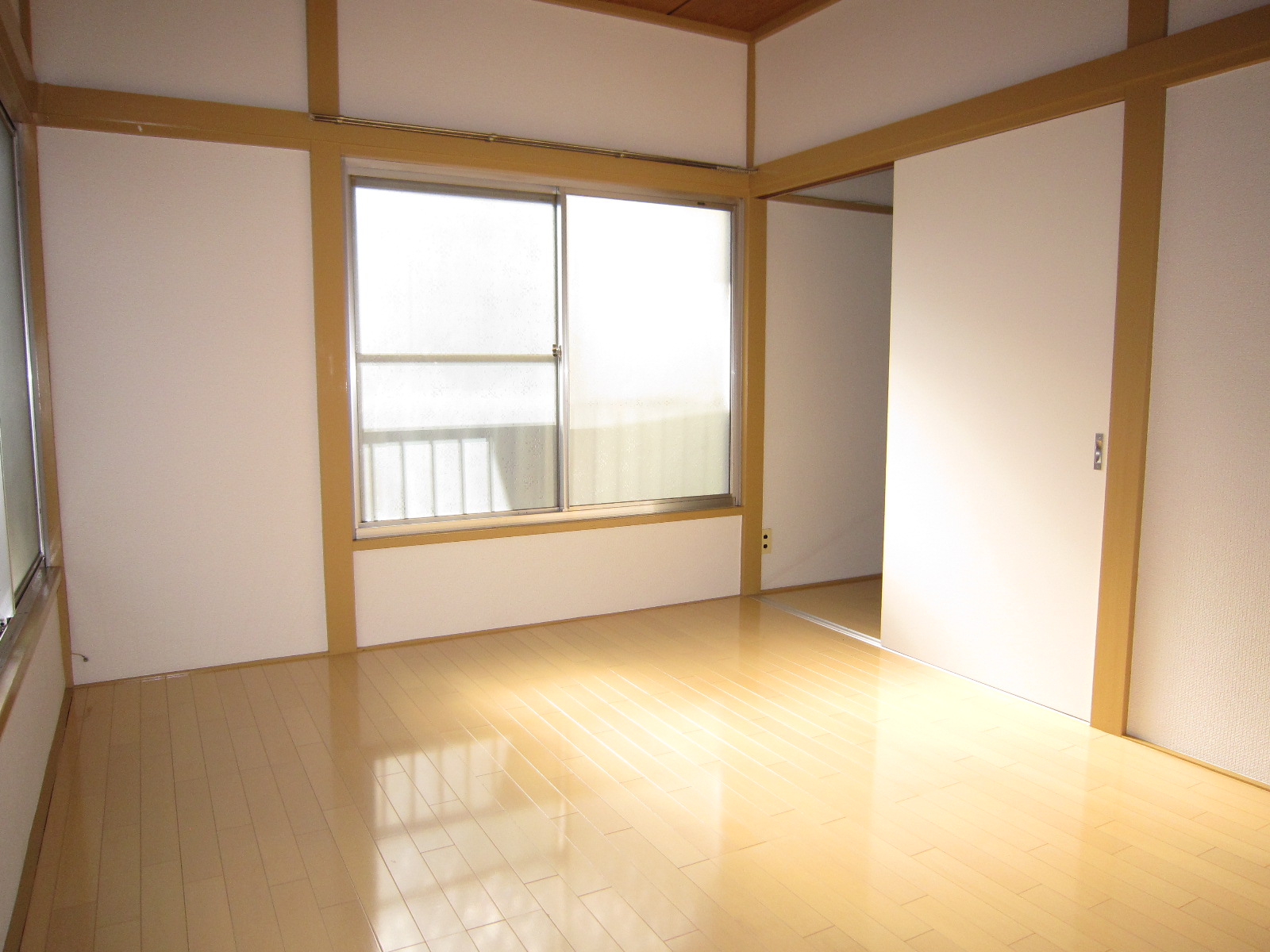 Living and room. It is a bright room with two-sided lighting!