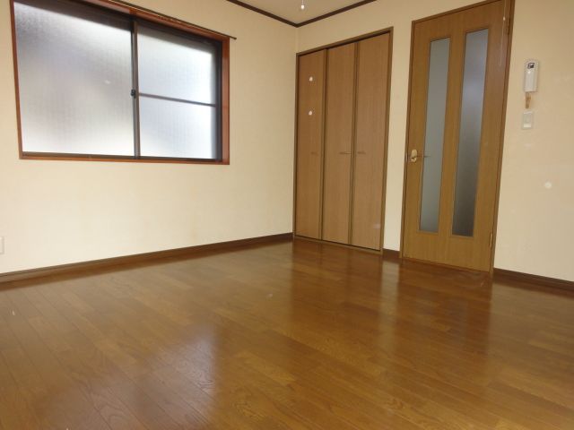 Living and room. It is a corner room.