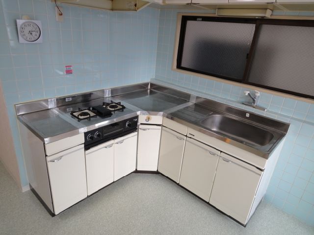 Kitchen. It is L-shaped kitchen.