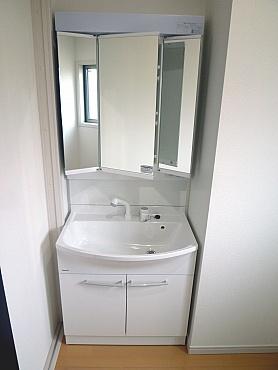 Wash basin, toilet. Bathroom vanity