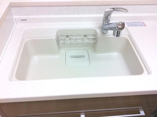 Kitchen. Wide sink with a water purifier is happy to be clean because washable dirt easily