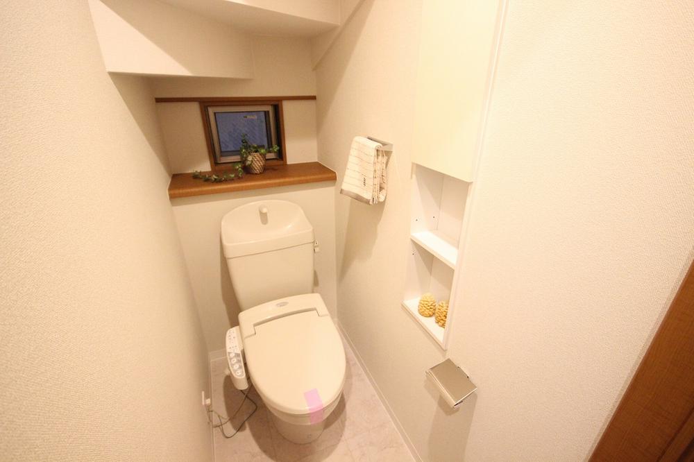 Toilet. Of using the space under the stairs