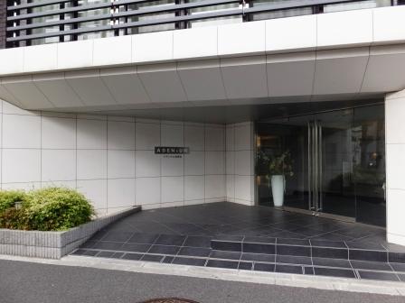 Entrance. Bright entrance employs a large tile white. Local (10 May 2013) Shooting