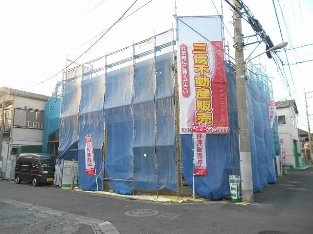 Local appearance photo. All three buildings site, including a corner lot