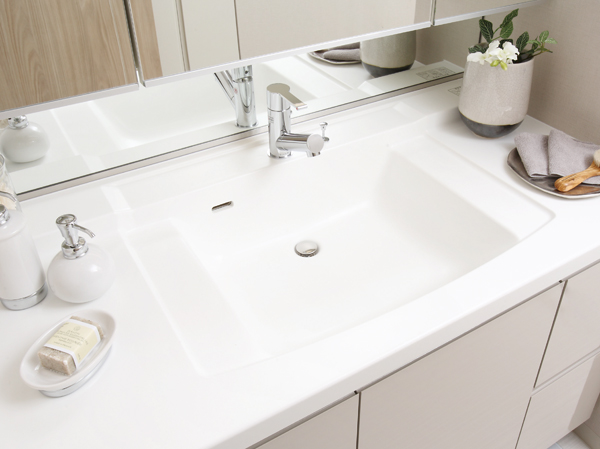 Bathing-wash room.  [Bowl-integrated basin counter] Basin counter counter tops with no integral joint of the artificial marble of the top plate and bowl. Excellent durability and design, It will produce a sophisticated space calm.