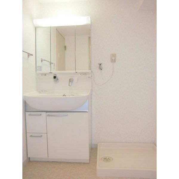 Wash basin, toilet. It is the washroom