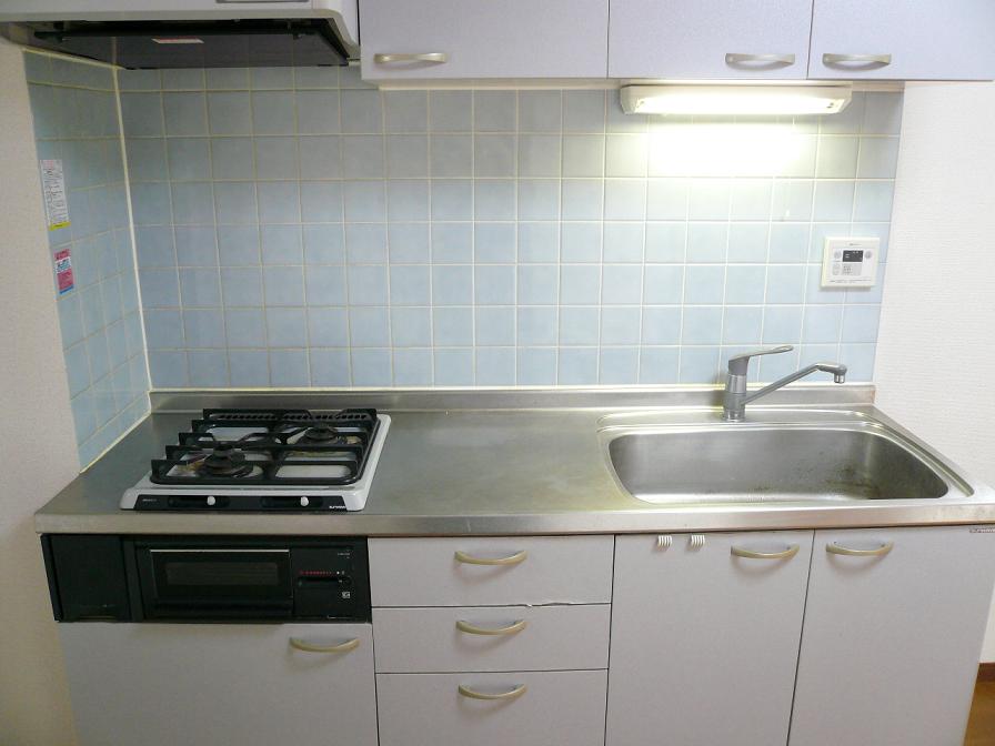 Kitchen. 2-neck is a gas stove. 