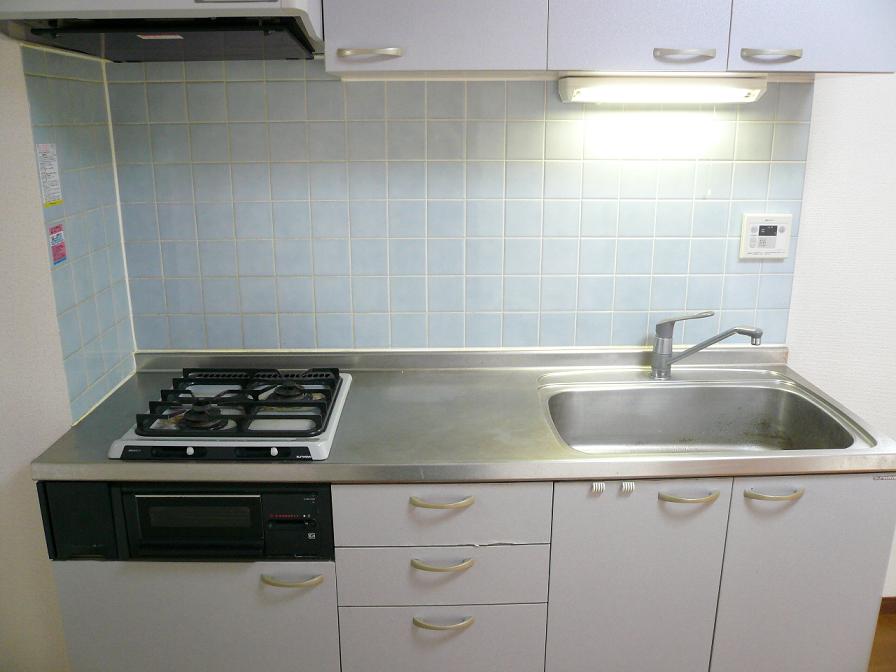 Kitchen. 2-neck is a gas stove.