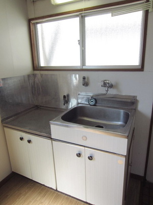 Kitchen. The kitchen is also bright because it is two-sided lighting