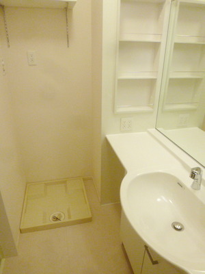 Washroom. Wash basin is a with large windows