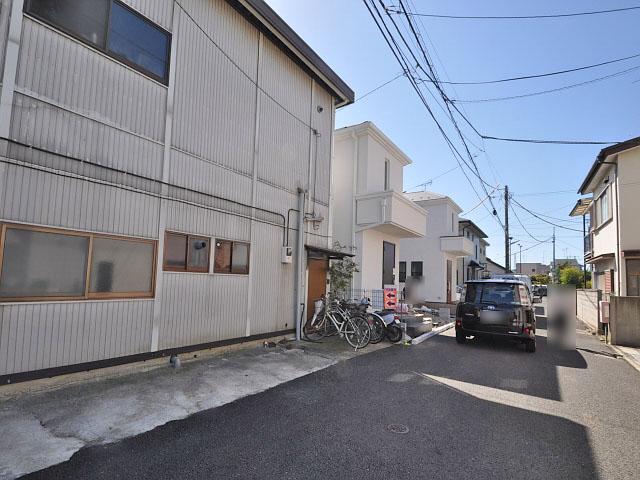 Local photos, including front road. Building 2 side contact road