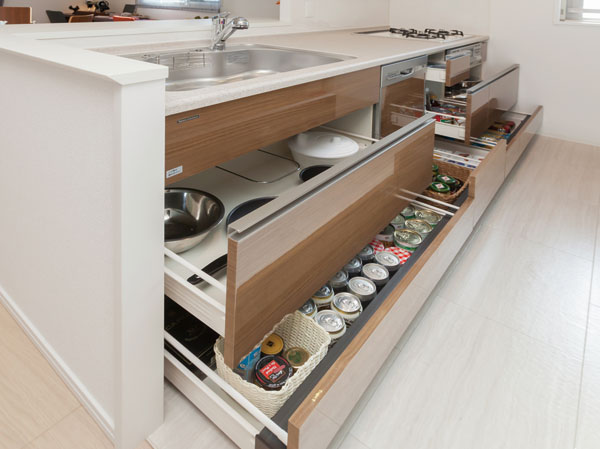 Kitchen.  [All slide storage] At the feet of tend kitchen becomes a dead space, Adopt an accommodating of out easily all slide type. Is versatile, comfortable housing design, It will produce a comfortable cooking and beautiful kitchen space.