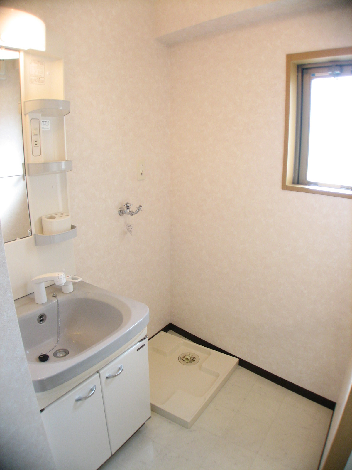 Washroom. Wide shower dresser washbasin Yes window