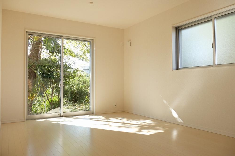 Living. Green of adjacent land is placed in the eye from the living room