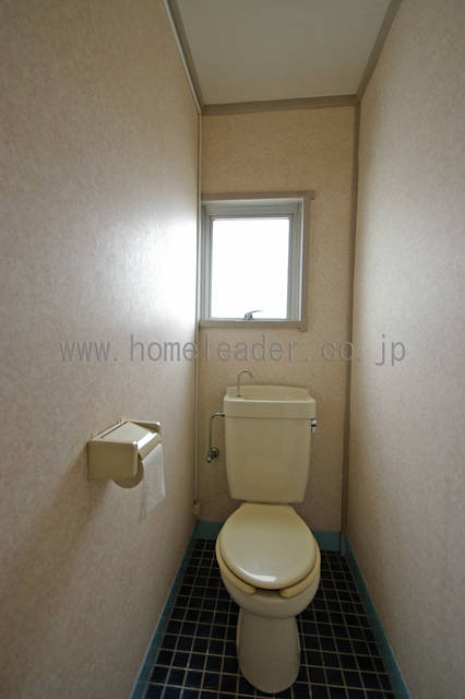 Toilet. There is a window in the toilet