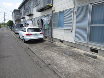 Parking lot. It is a security worry because there is a parking lot in front of the eye