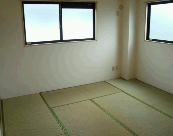 Living and room. It is a good Japanese-style room ventilated in with storage.