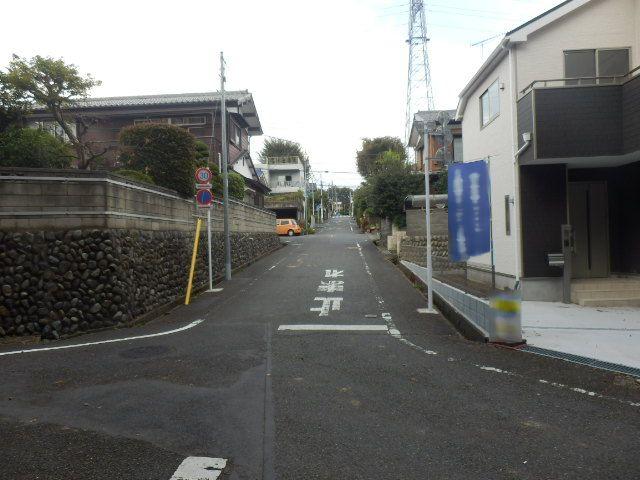 Local photos, including front road. 1 Building