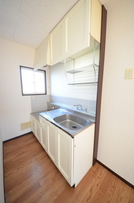 Kitchen. Bright kitchen with a small window