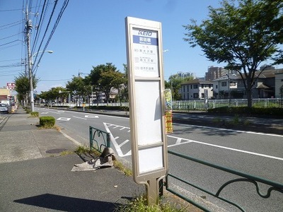 Building appearance. The bus stop is before the property of the eye