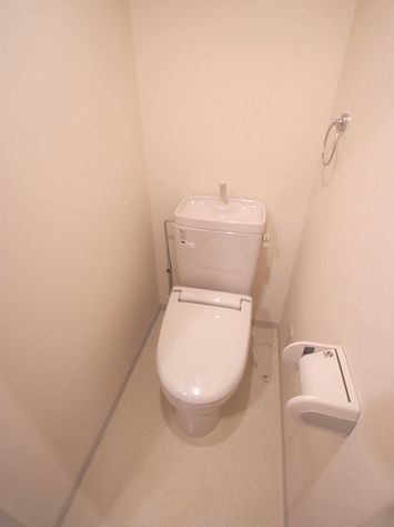 Toilet. Same building, It will be photos of the same floor plan. 