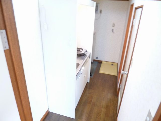 Other room space. It is seen from the room's entrance side