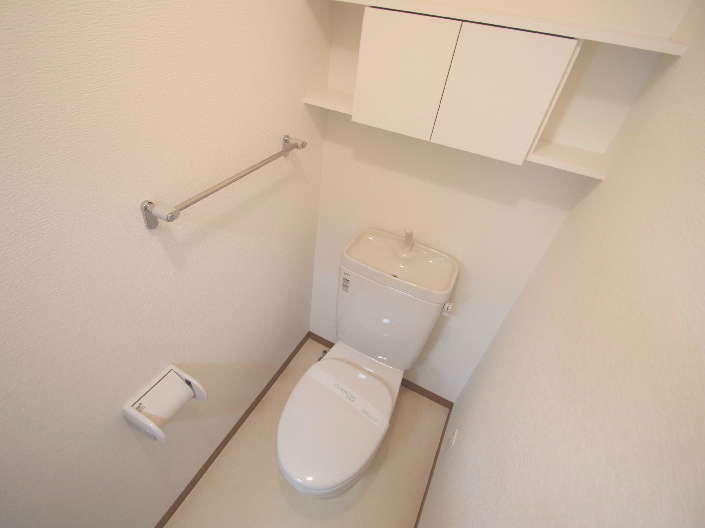 Toilet. It will be in the photo of the room on the same floor plan of the building. 