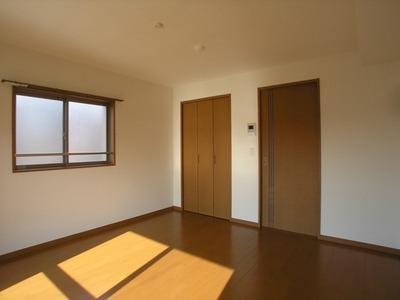 Living and room. It is a bright room with two-sided lighting