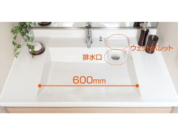 Bathing-wash room.  [Artificial marble LJ counter] Wash bowl of simple design. It was to be able to use widely the whole basin bowl the location of the drain outlet in the right back. It is with a wet palette wet things put.