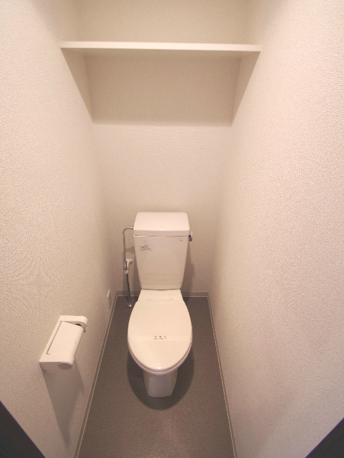 Toilet. Will be in the photo of the floor plan with different same building (image)