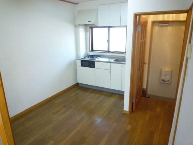 Living and room. Also spacious kitchen