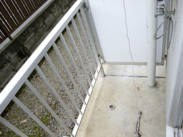 Balcony. Washing machine storage is located in the veranda. 