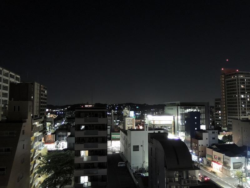 View photos from the dwelling unit. Night view from the balcony
