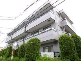 Building appearance. Appearance, surrounded by green