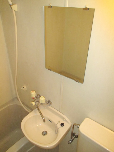 Washroom. It is a wash basin with a mirror